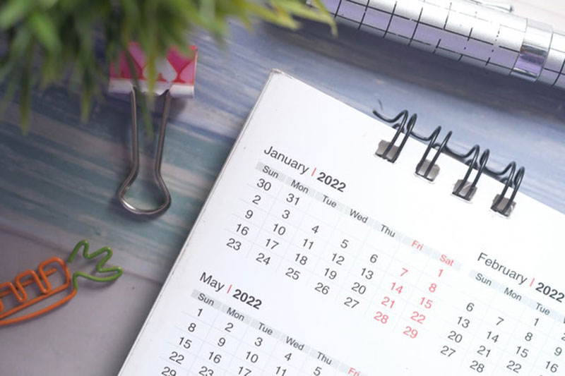 Calendar placed on a wooden desk