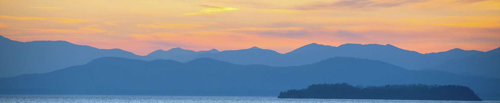 Sunset over Mountains and Lake Champlain with Islands visible